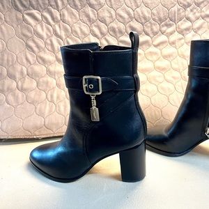 Coach Woman’s boots.  Like new. Heel is 3 inches